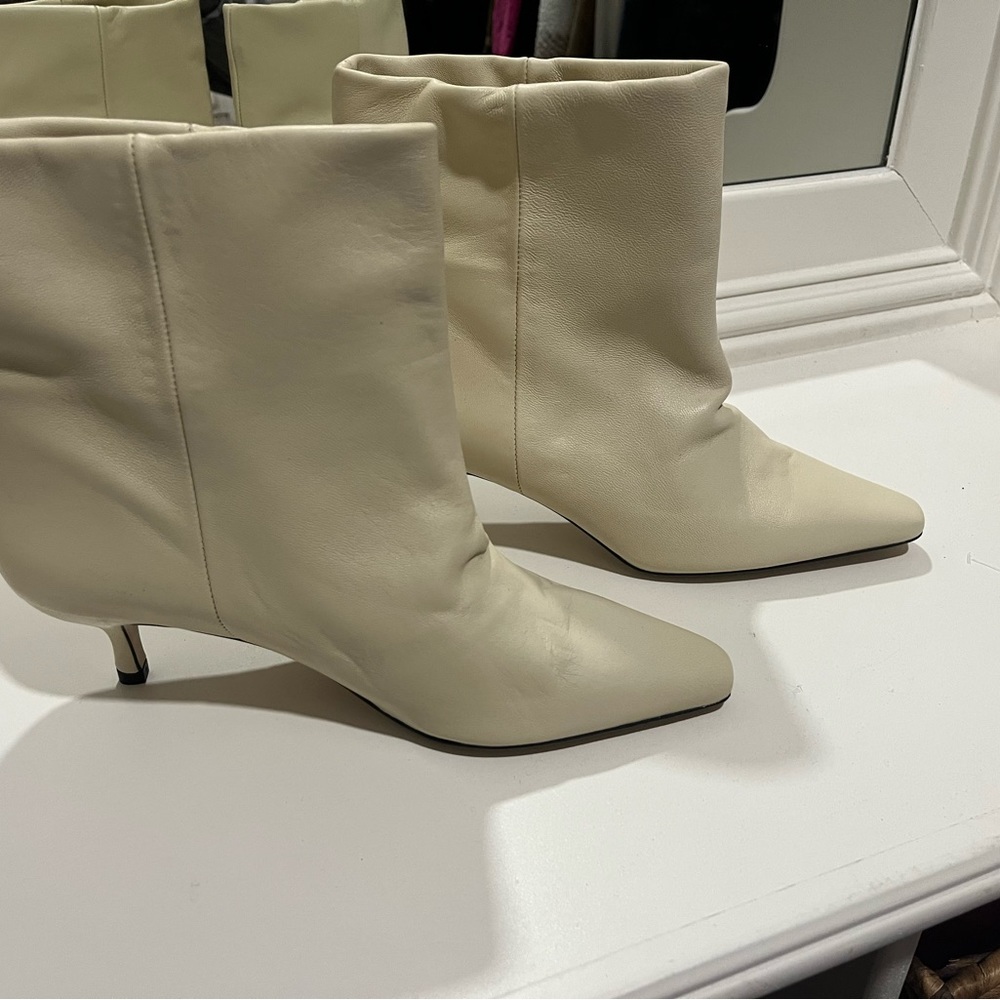Brand new, never worn Ivylee Copenhagen "Penelope" short bootie in off white.